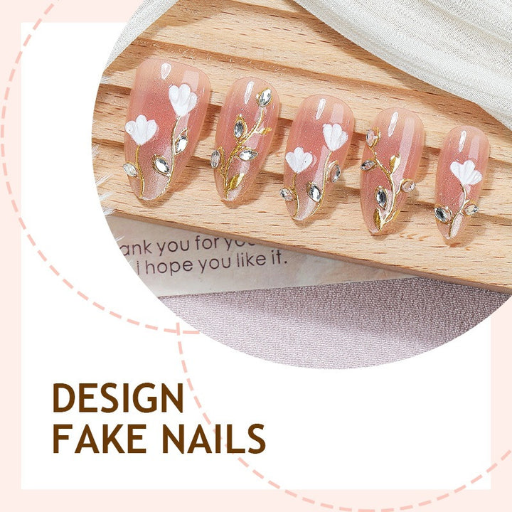 Artificial nail set with delicate floral patterns and elegant accents Stornfield