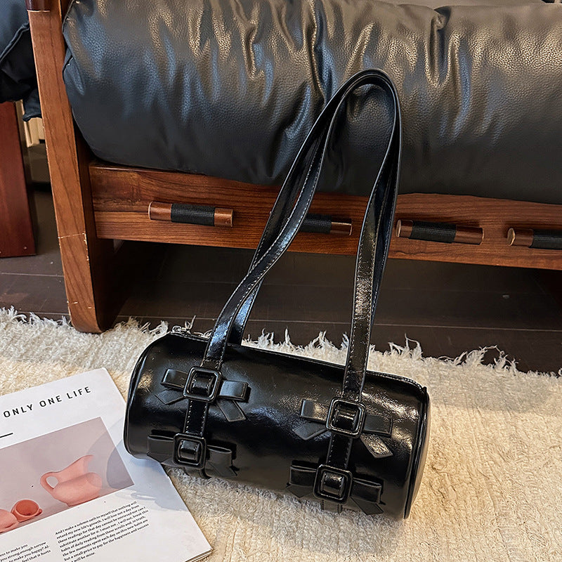 Bow-Accent Barrel Bag