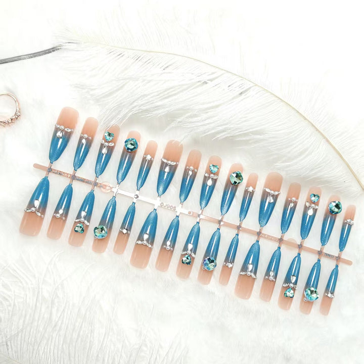Glamorous artificial nails with sparkling rhinestone elements Stornfield