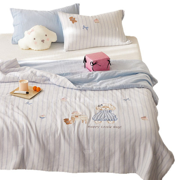 Quilted bedding and throw set with appliquéd plush puppy made of cotton muslin