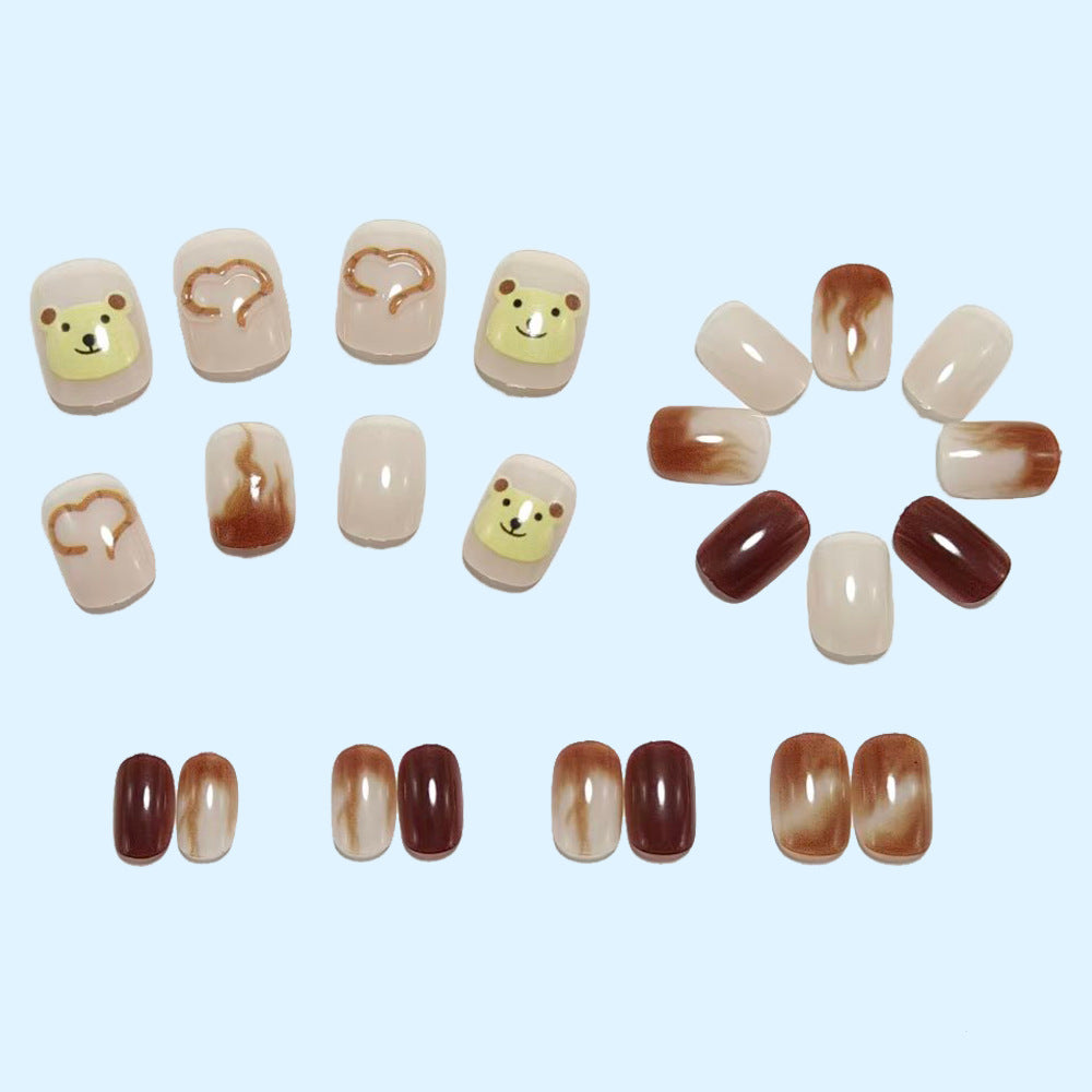 Artificial nails with cute bear design and marbled pattern Stornfield