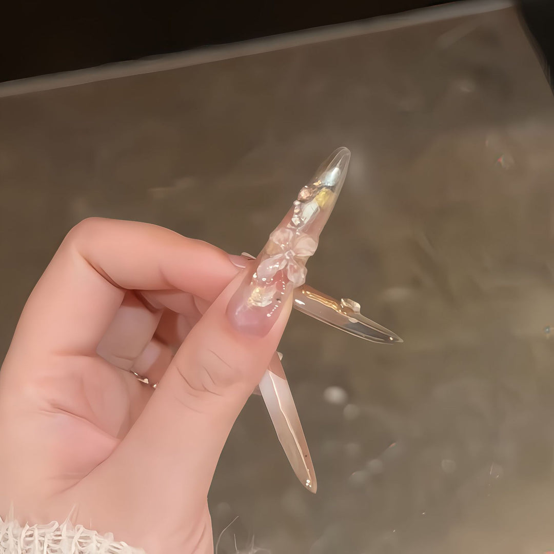 Art nails with filigree floral designs Stornfield