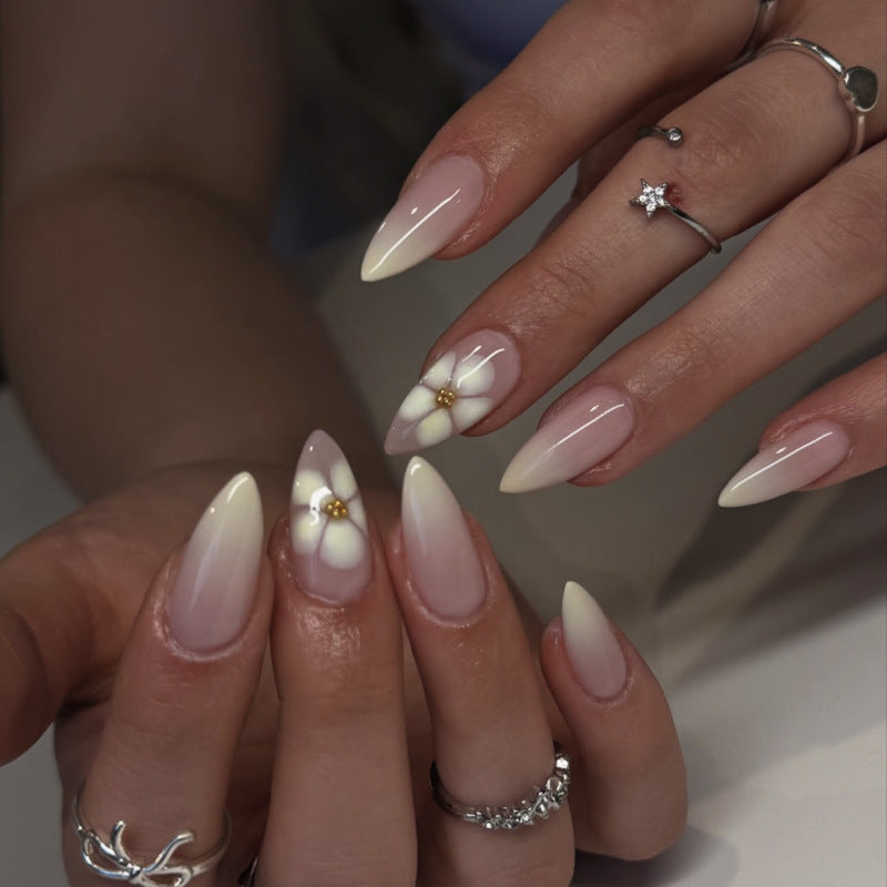 Elegant Stiletto Nails with Floral Accents Stornfield