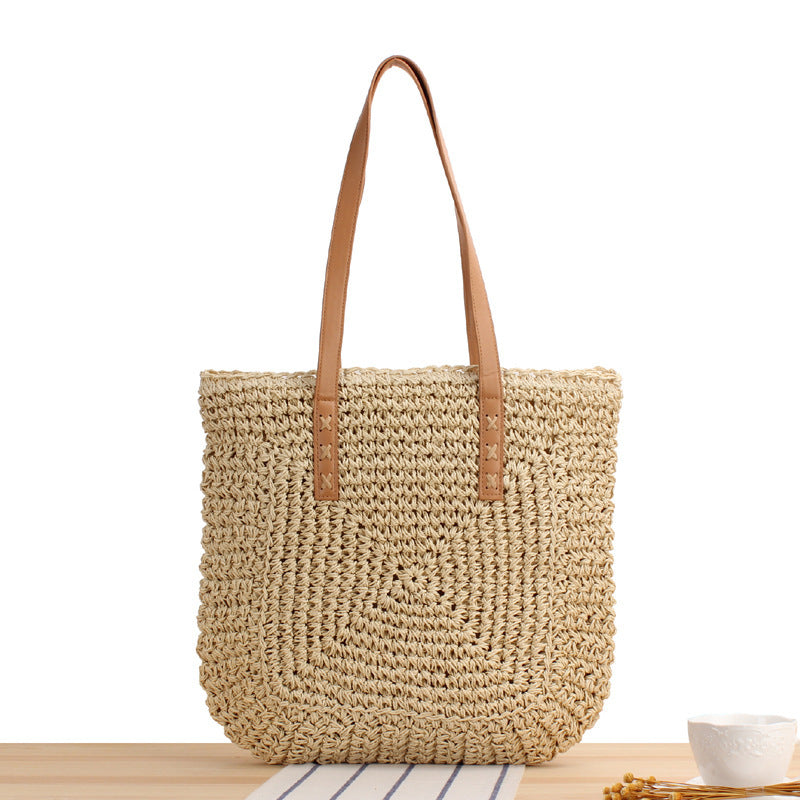Natural bast shoulder bag with leather handles Stornfield