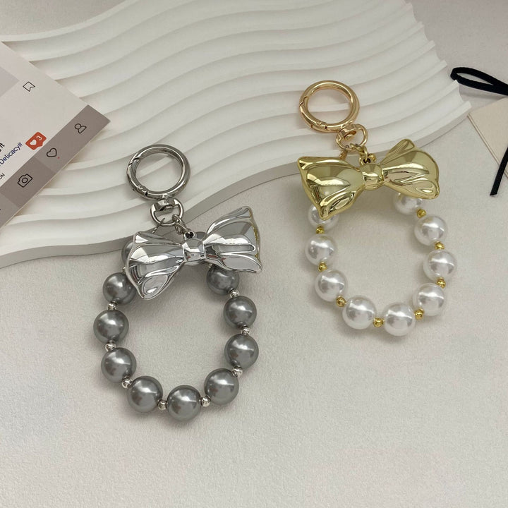 Elegant Pearl Bow Keychain Stornfield