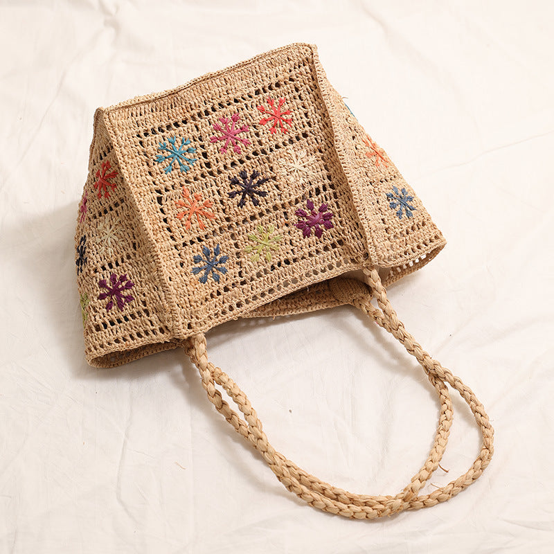 Handcrafted straw bag with colorful embroidery design Stornfield