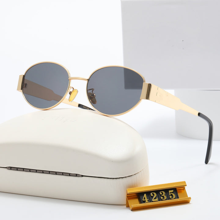 Ladies Elegant Designer Sunglasses with Filigree Frame and UV Protection Stornfield