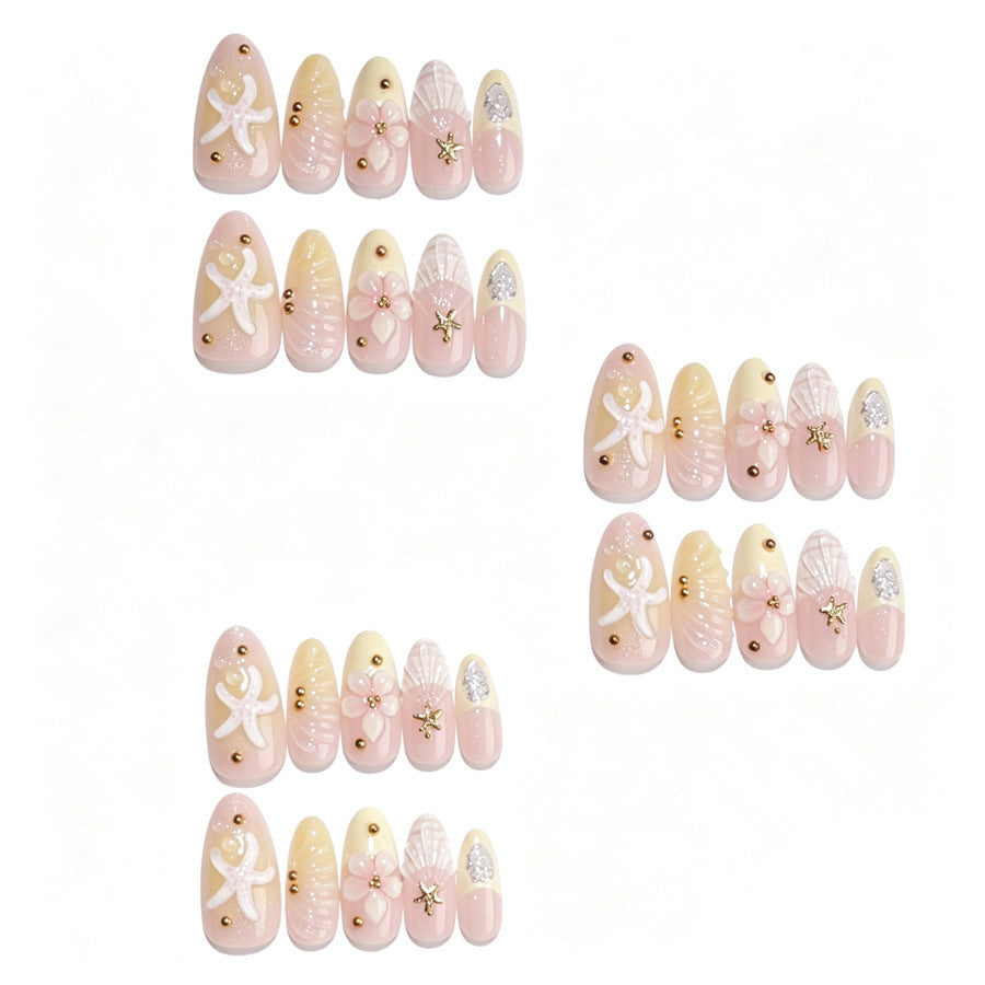 Artificial nail set with floral 3D elements and golden accents Stornfield