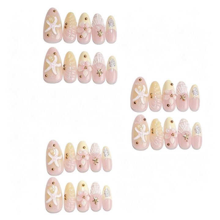 Artificial nail set with floral 3D elements and golden accents Stornfield