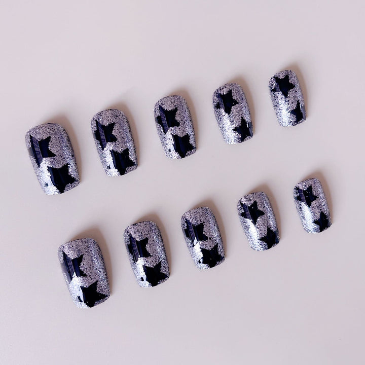 Artificial nail set with glamorous rhinestone embellishments and star motifs Stornfield