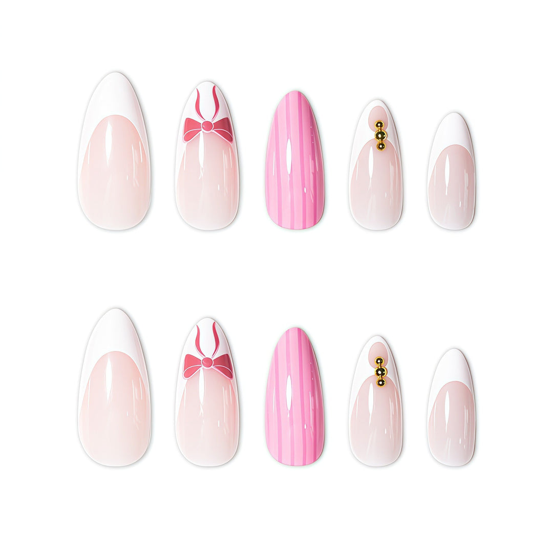 Elegant Stiletto Nail Art Enhancements with Decorative Accents Stornfield