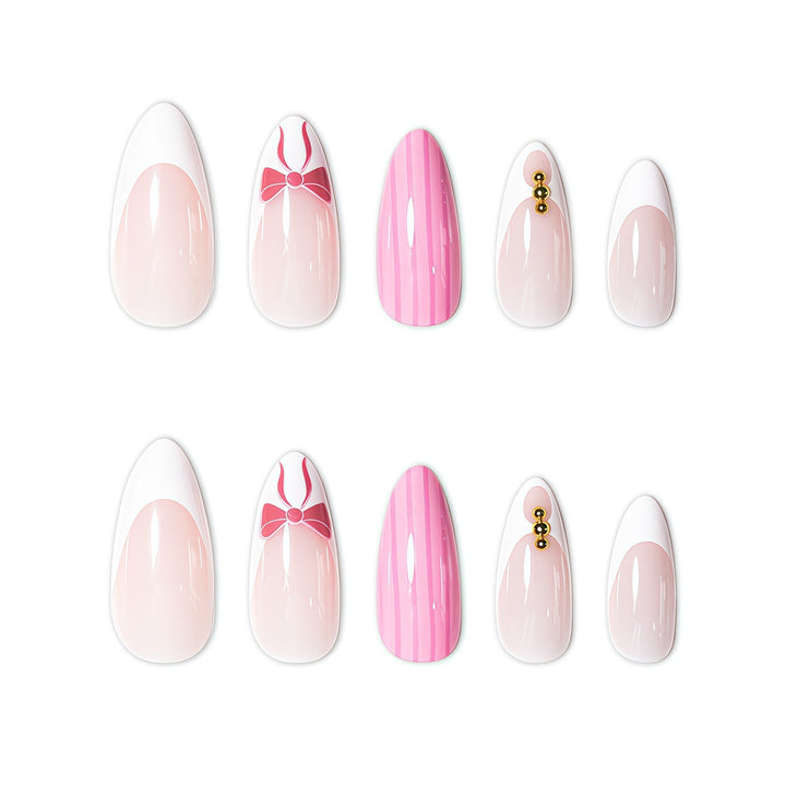 Elegant Stiletto Nail Art Enhancements with Decorative Accents Stornfield