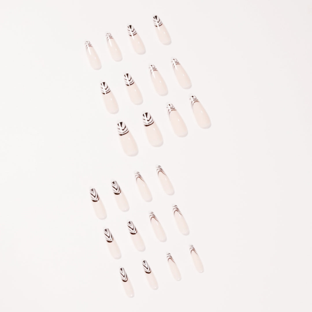 Artful Nail Extensions with Elegant Black-White Pattern Stornfield