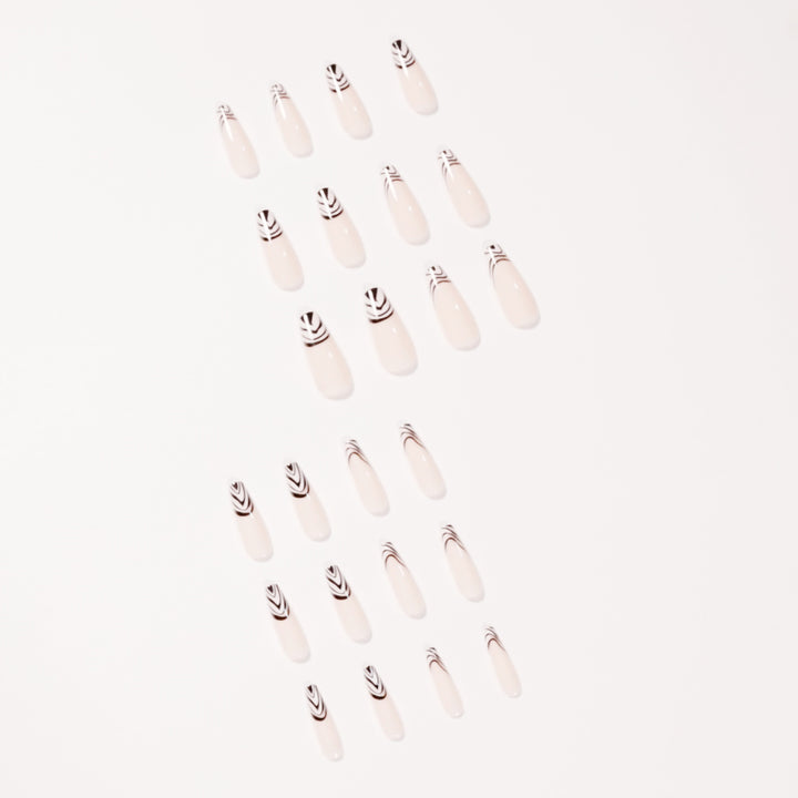 Artful Nail Extensions with Elegant Black-White Pattern Stornfield