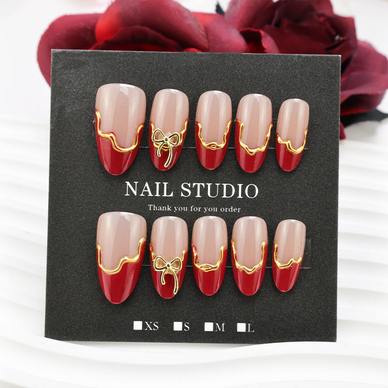 Fake nail set with flower and gold details Stornfield
