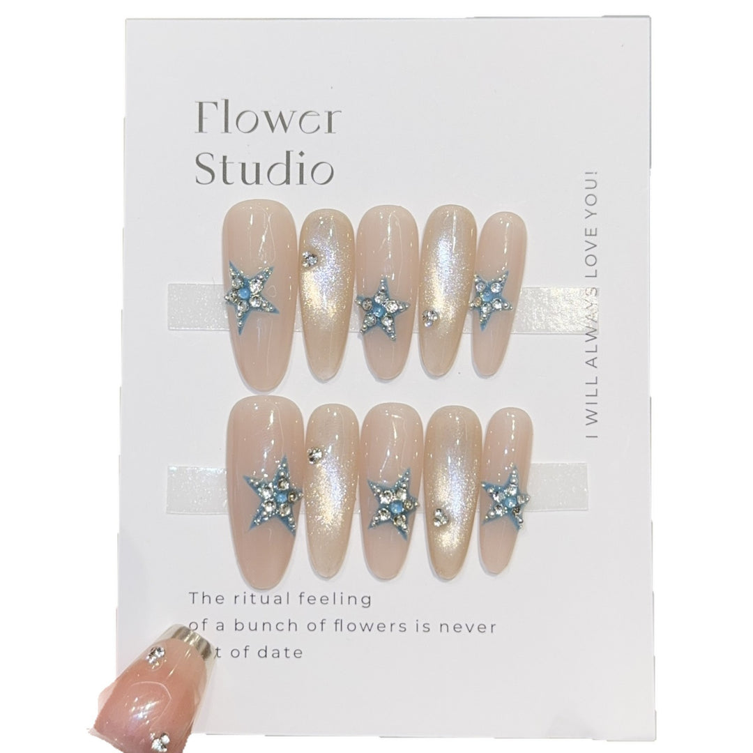 Glamorous artificial nails with star accents Stornfield
