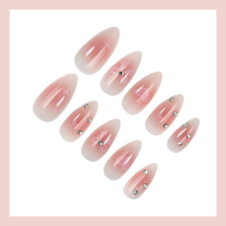 Artificial nail set with romantic heart and bow motifs Stornfield