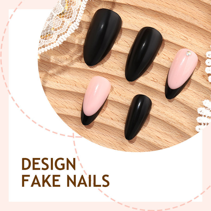 Acrylic nail set with elegant black-pink design and rhinestone-embellished accents Stornfield