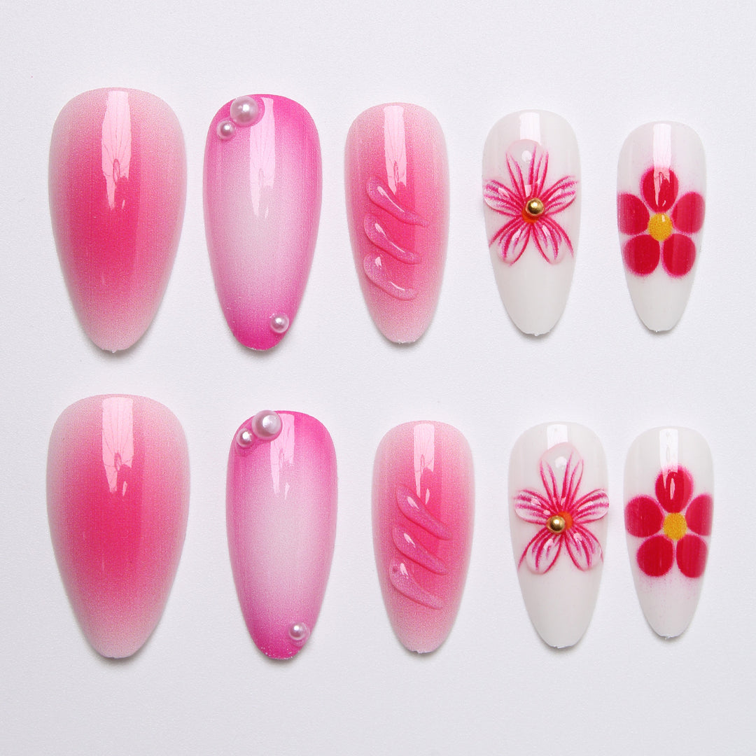 Artificial nail set with delicate flower designs and shimmering accents Stornfield