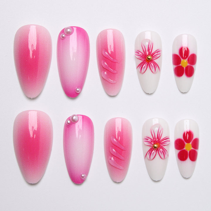 Artificial nail set with delicate flower designs and shimmering accents Stornfield