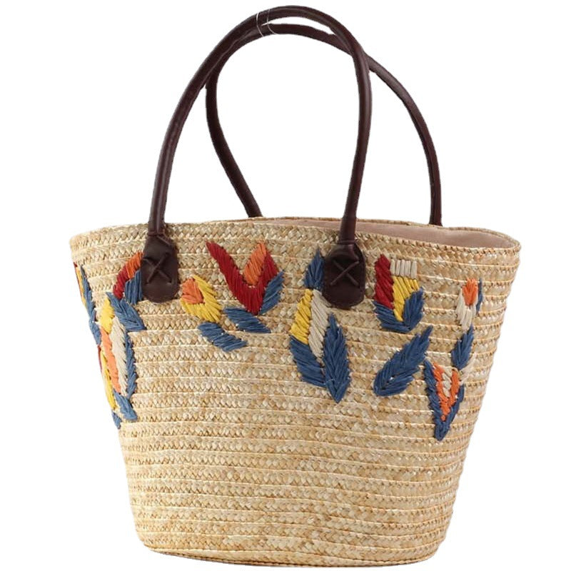Braided beach bag with colorful embroidery pattern Stornfield