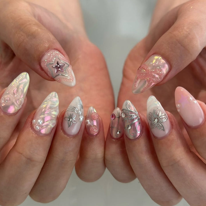 Artistic nail extensions with shiny embellishments Stornfield