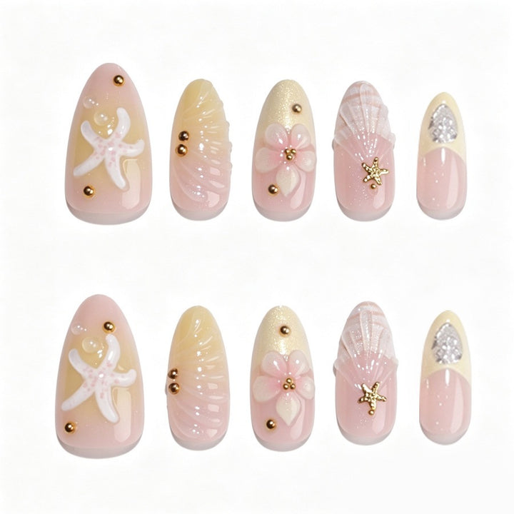 Artificial nail set with floral 3D elements and golden accents Stornfield
