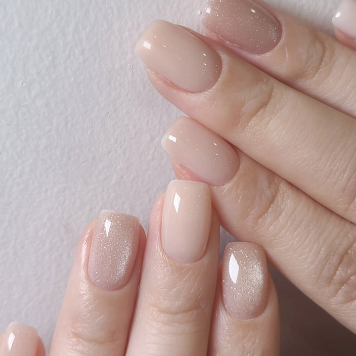 Artificial nail extensions with elegant glitter effect Stornfield