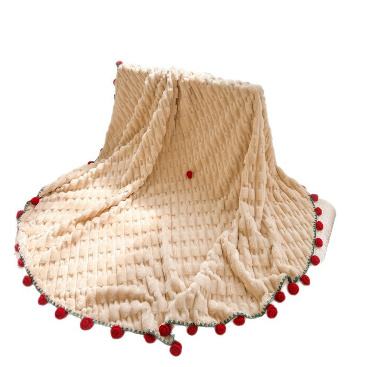 Cuddly blanket with crocheted rose trim and plush texture