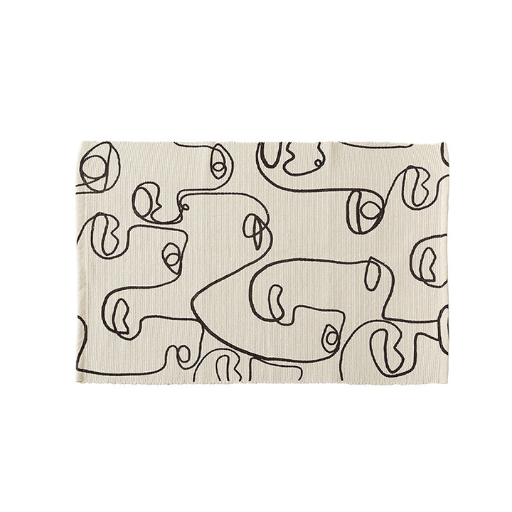 Table mat made of cotton fabric with abstract line art motif