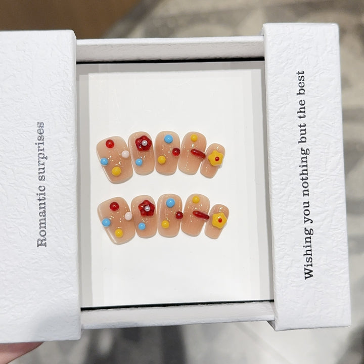 Artificial nails with colorful 3D accents Stornfield