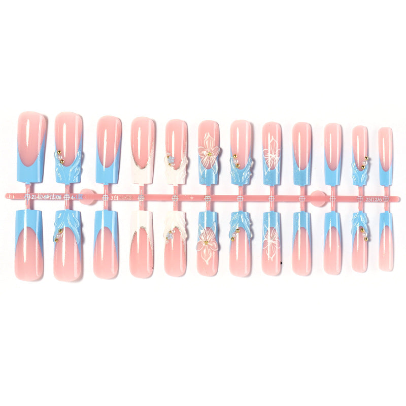 Artistic Nail Art Set with Floral and Glossy Accents Stornfield