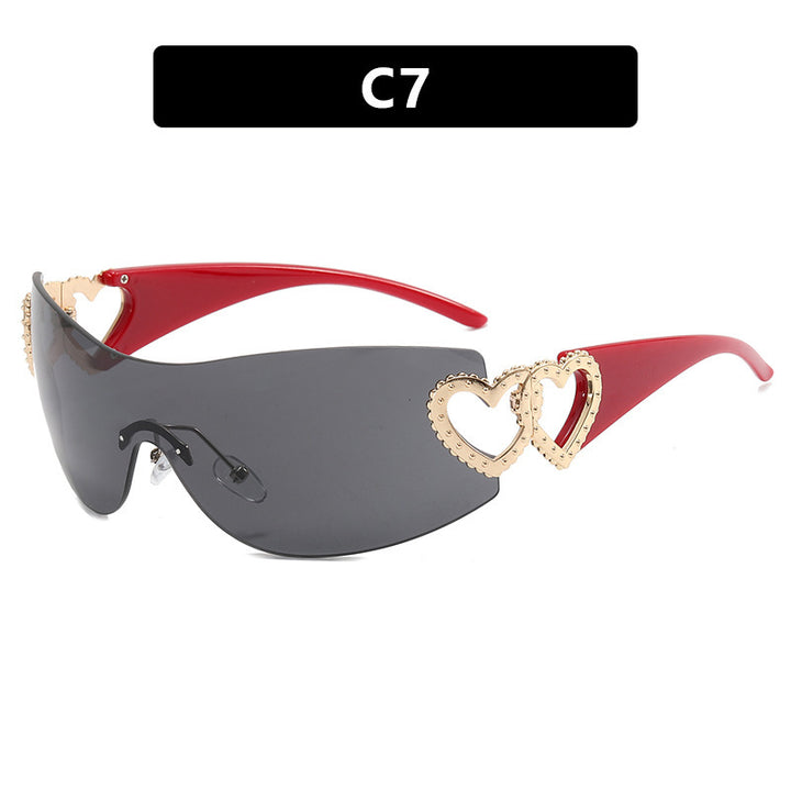 Ladies sporty sunglasses in trendy shield design with heart accents Stornfield