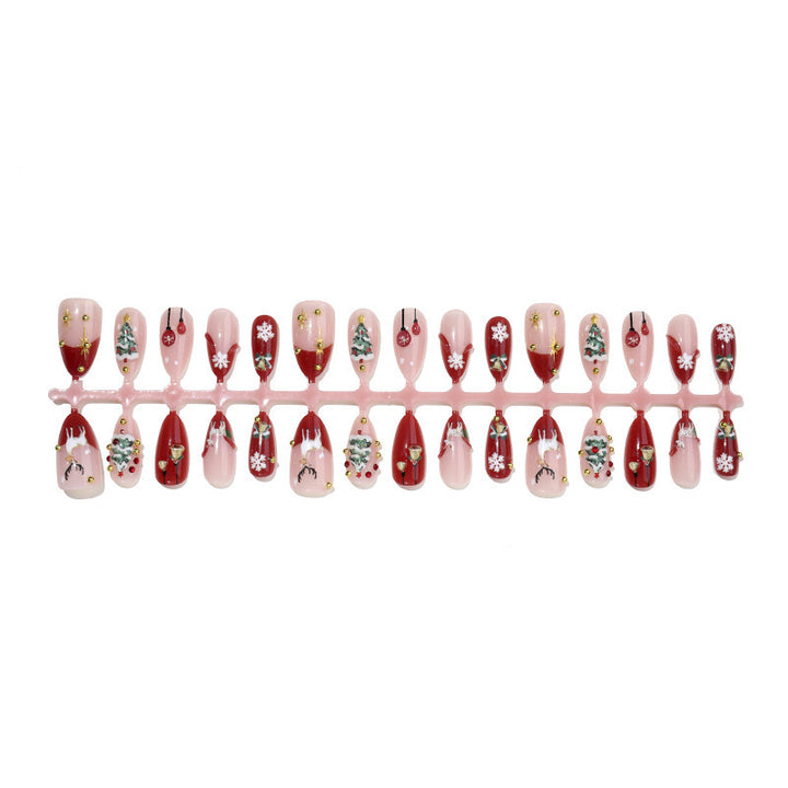 Artificial nail set with festive designs and glitter elements Stornfield