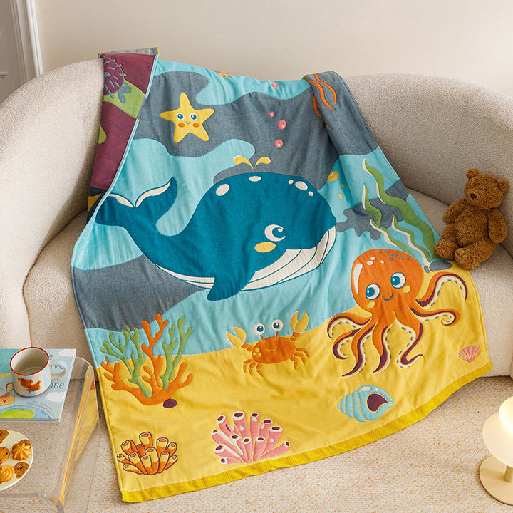 Kids' cuddly blanket with cheerful vehicle print made of soft microfibre