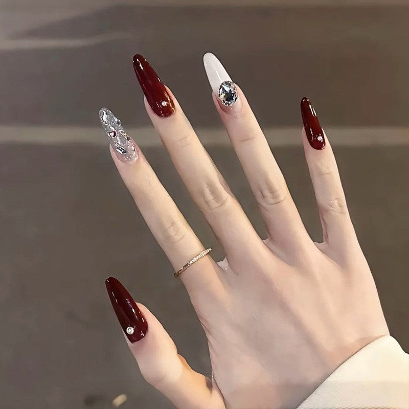 Elegant artificial nails with sparkling gold accents Stornfield