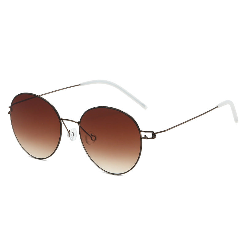 Women round sunglasses with light metal frame and gradient lenses Stornfield