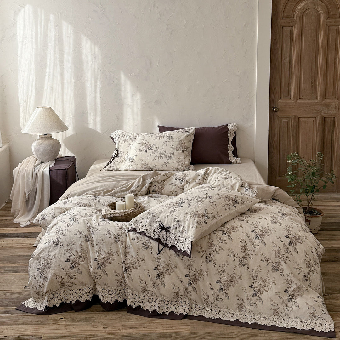 Satin bed linen set with romantic floral pattern and lace border Stornfield