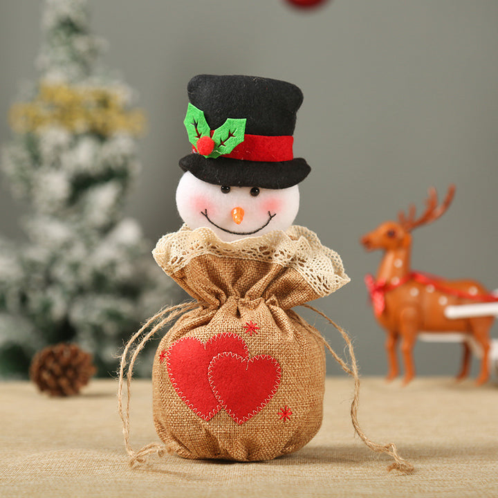 Cute Christmas gnome with gift sack Stornfield