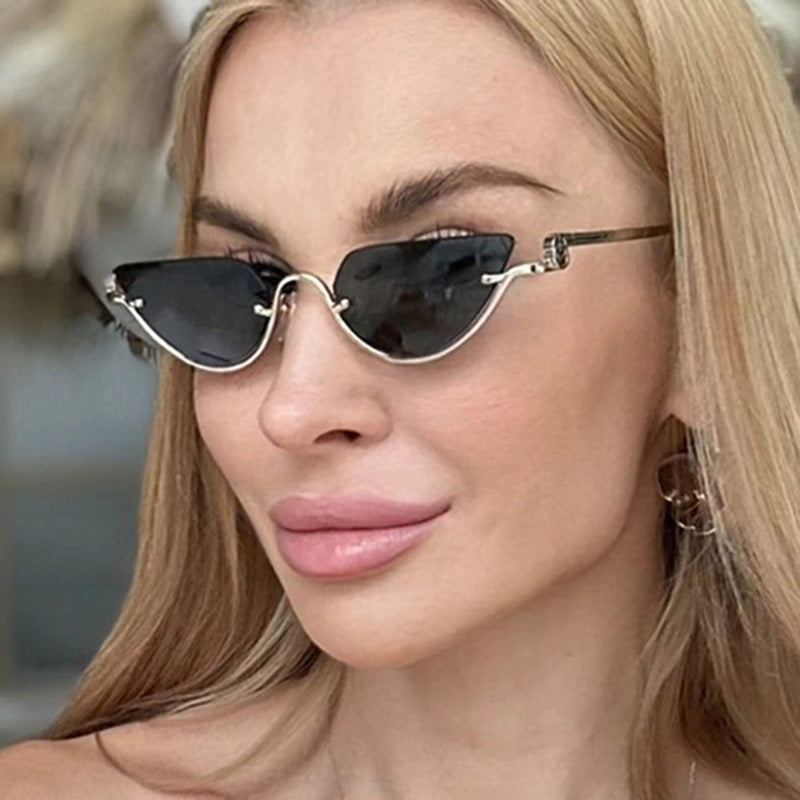 Ladies Cat-Eye Sunglasses with Gold-Colored Metal Frame and UV Protection Stornfield
