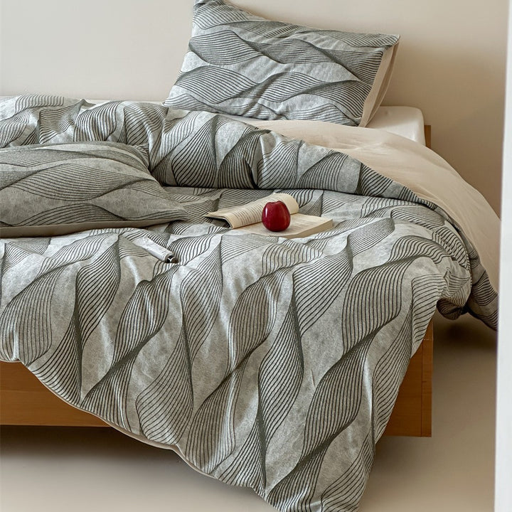 Bedding set made of cotton satin with organic wave print