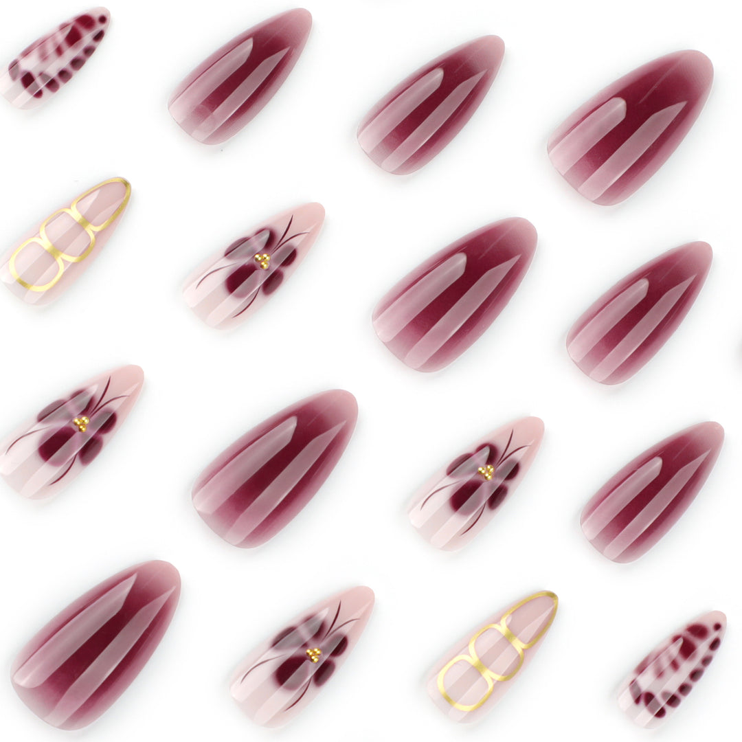 Elegant Nail Art with Floral Design and Glitter Accents Stornfield