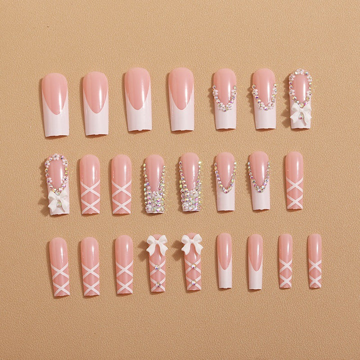 Elegant artificial nails with rhinestones and floral design Stornfield