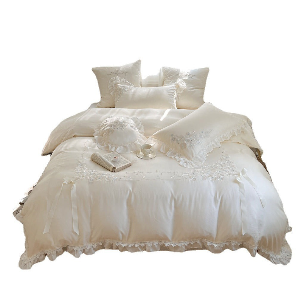 Victorian-inspired cotton satin bedding set with lace ruffles and bows