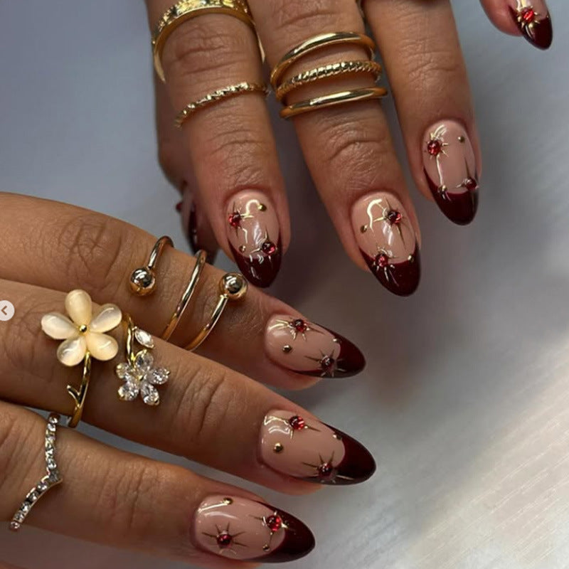 Acrylic nail set with sparkling stars and elegant marble effect Stornfield
