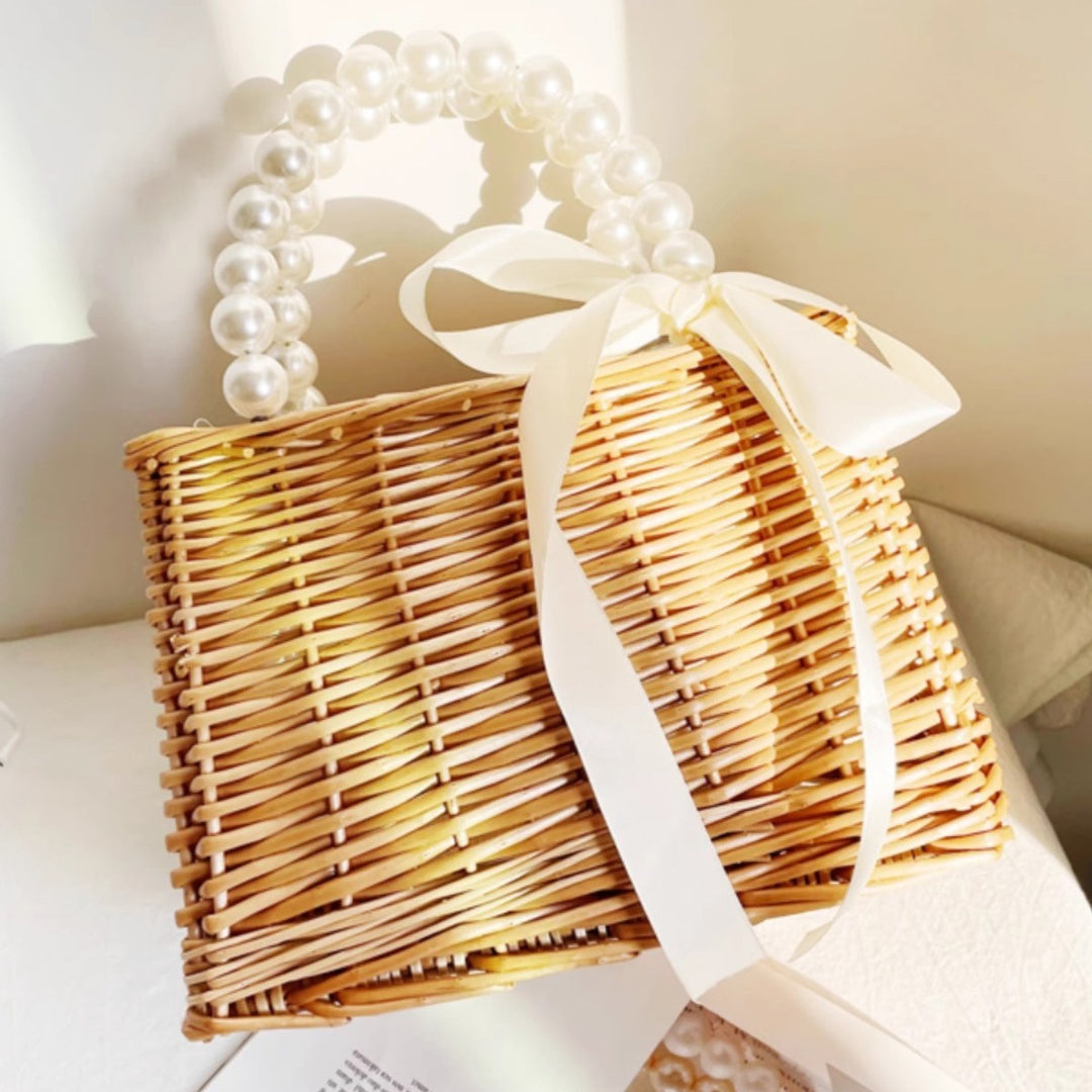 Ladies handbag made of braided material with elegant pearl handles Stornfield
