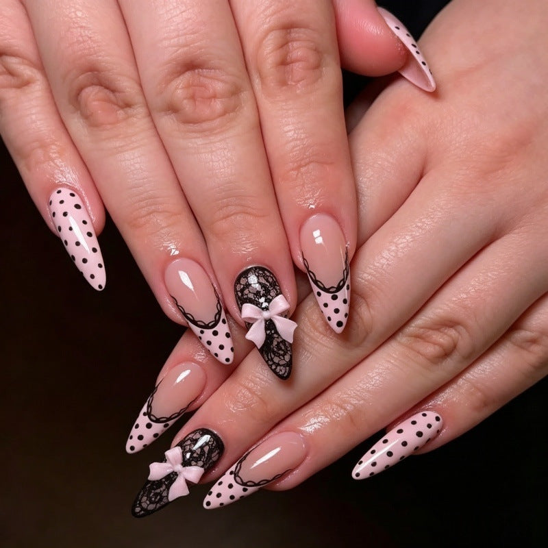 Elegant artificial nails with lace design and bow accents Stornfield