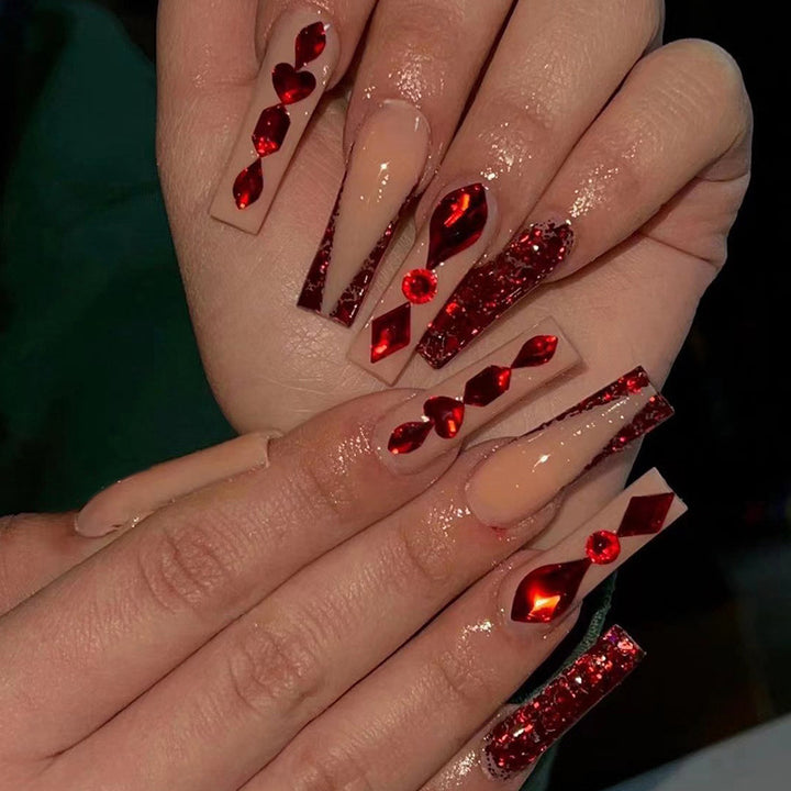 Artfully designed nail extensions with sparkling accents Stornfield