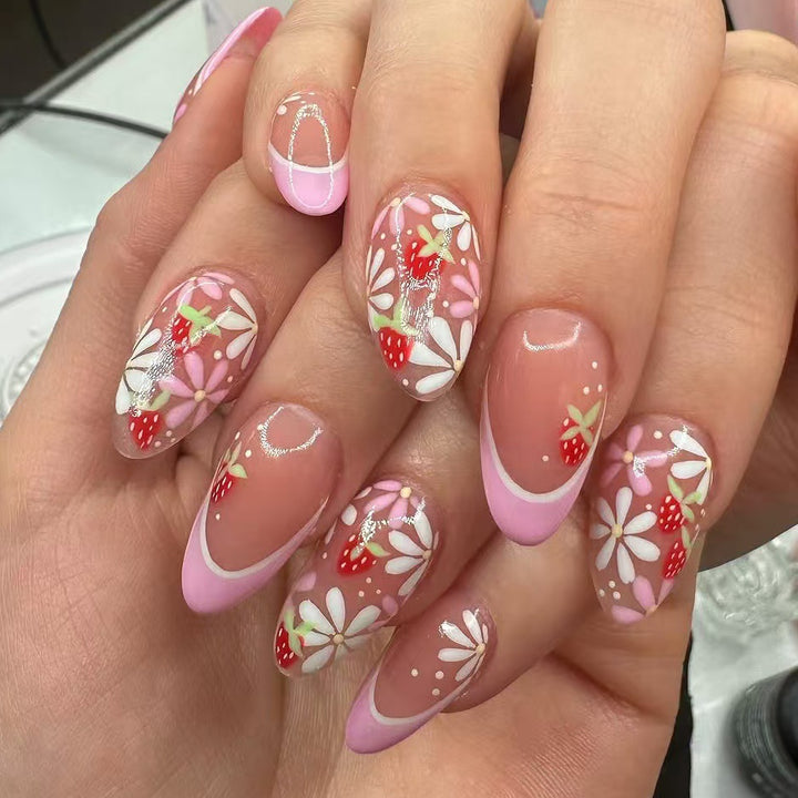 Artificial nail set with playful flower and strawberry motifs Stornfield