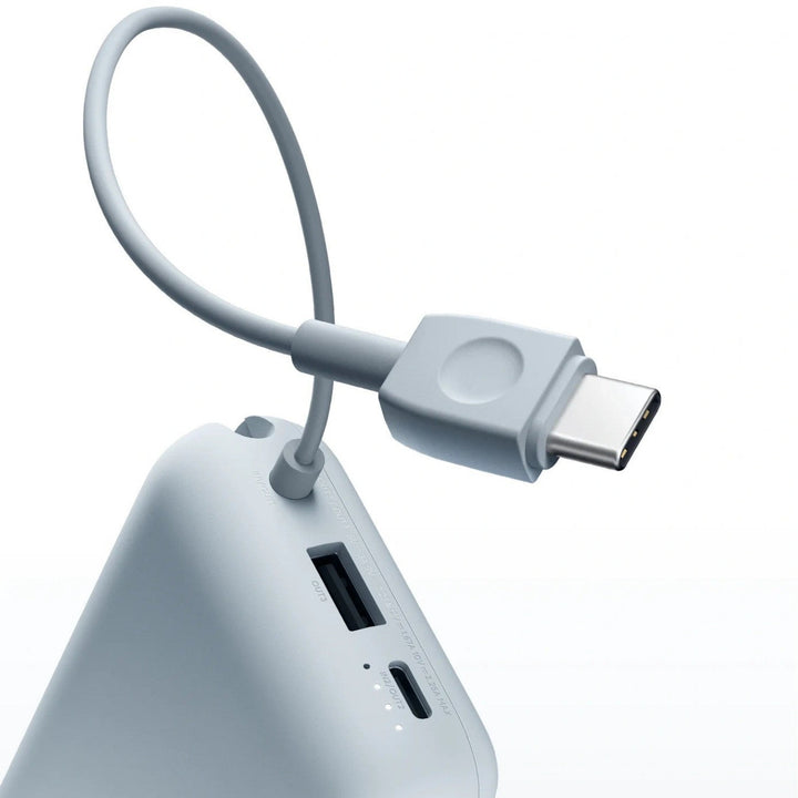 Compact High-capacity portable power bank with integrated USB-C cable and silicone carry loop Stornfield